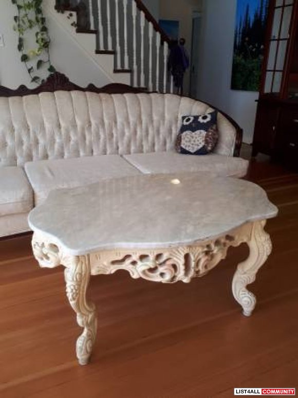 Beautiful coffee table and two round side tables. Solid marble tops wi
