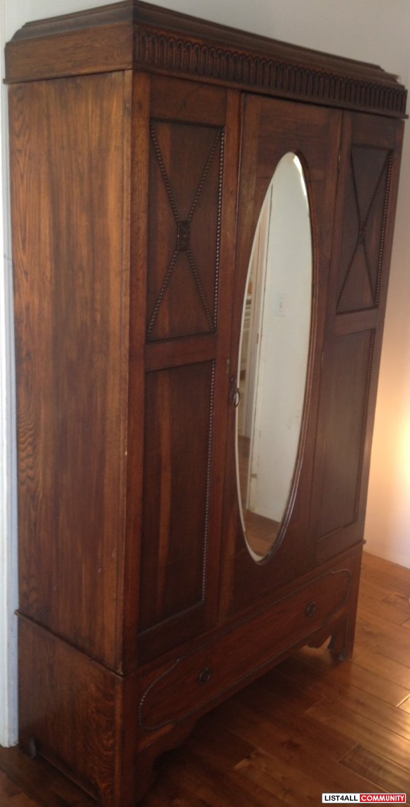 Antique Armoire with Oval Mirror
