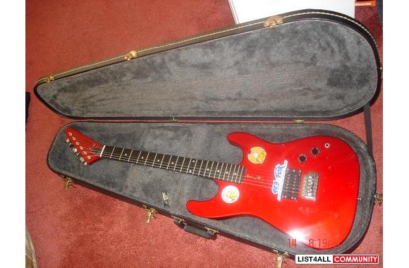 Electric guitar by Artist comes with hard case - $