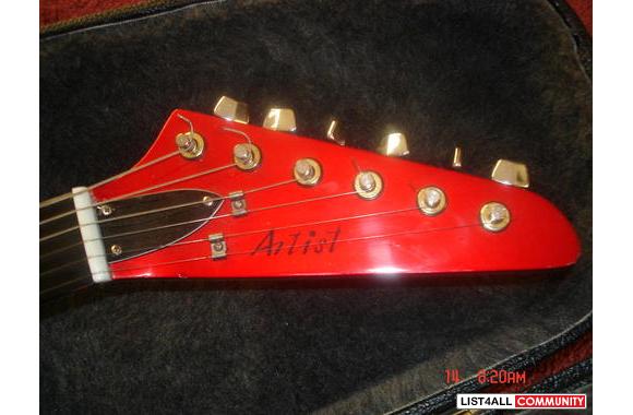 Electric guitar by Artist comes with hard case - $
