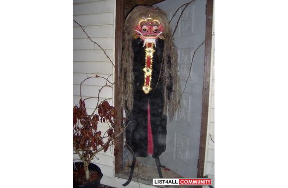 2 very scary Indonesian masks. 1 Polynesian mask. 