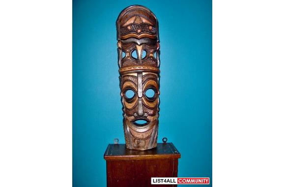 2 very scary Indonesian masks. 1 Polynesian mask. 