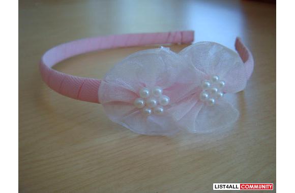 Girls pink princess style hair band with little fl