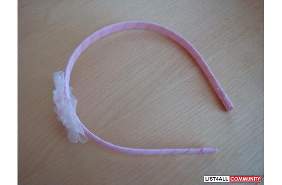 Girls pink princess style hair band with little fl