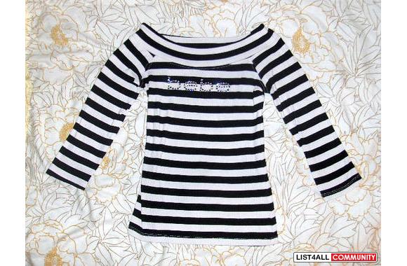 Striped  Bebe  3/4 sleeve top. Size Med. fits X-Sm