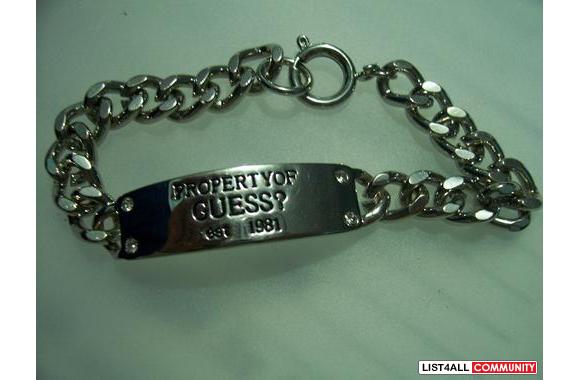 GUESS braceletsays " property of Guess "