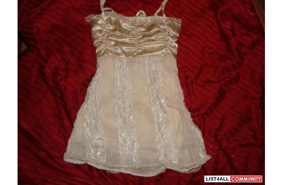 very cute gold dressy top size small or xsmall good condition