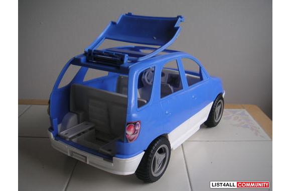 Blue Minivan with opening hatch.
