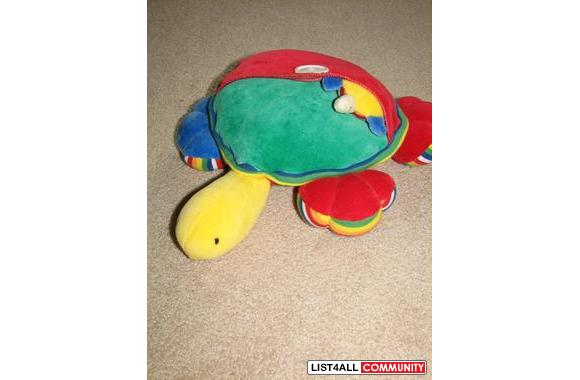 Turtle Plush toy. Kids can practice buttoning/unbuttoning