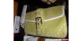 Coach wristlet.&nbsp; Green suede.&nbsp; Still has tag on it (never us