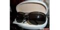 Iceberg sunglasses.&nbsp; Green/brown lens frame.&nbsp; New with hard 