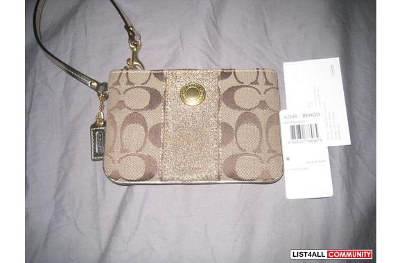 gold coach wristlets