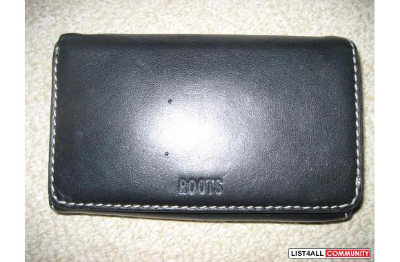 ROOTS wallet. I think it's big enough for a checkbook.