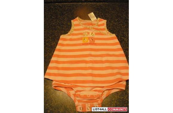 one piece sun dress. Dark and light pink stripes. Says 'sweet as sprin