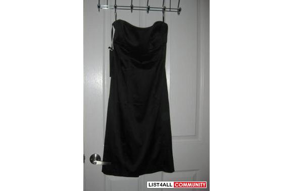 Black BEBE Slim Sexy Tube Dress, size Large&nbsp;  This is a simple pl