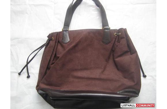 This is an understated, two-tone brown handbag