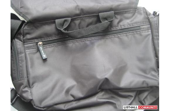 This is an all black messenger bag, perfect for a trip or those on the