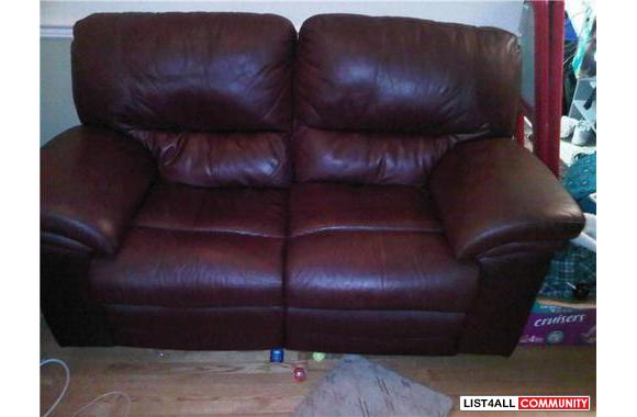 Beautiful mocha leather love seat (pictured) both sides recline with b
