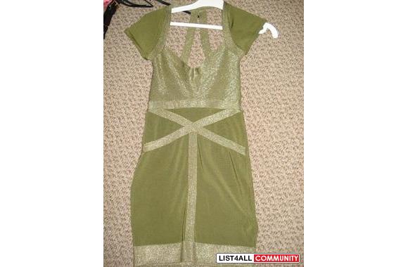 NWOT. Bebe dress. size small. tight fitting. above knee length. Great 