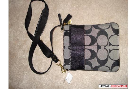 Coach Signature Stripe SwingpackRetails: $150 incl