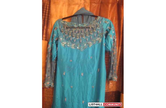 Ferozi+Color ferozi color stylish dress...net style sleeves n neck..heavy work on ...