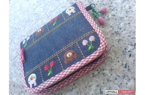 Walletsvery cute walletsboth could hold coinseach 
