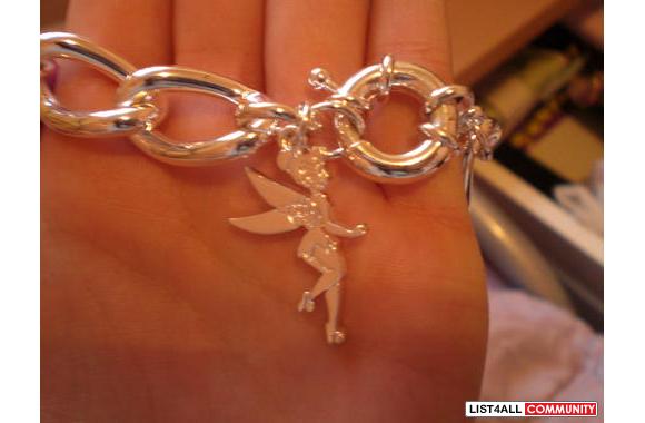 Tinker bell bracelethas a skull in the middlesuper