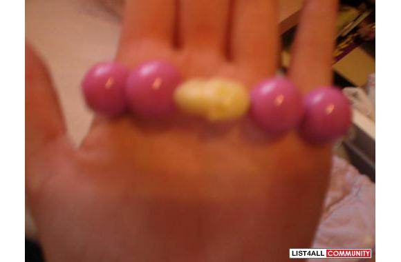 Tinker bell bracelethas a skull in the middlesuper