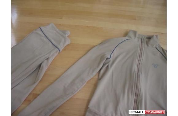 XXS TNA tan spandex suite with navy pipingRETAIL: 