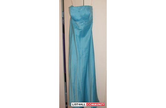 Hi ! I am selling this Long Blue Silky Dress worn once to my grad