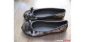 Gold/brown flats.&nbsp; Brand new, never worn.&nbsp; Size 7.5