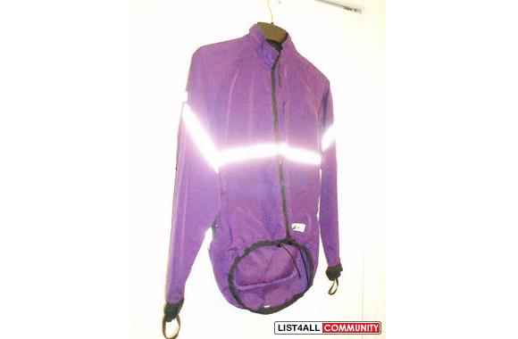 MEC (Mountain Equipment Coop) running jacket in purple with reflective