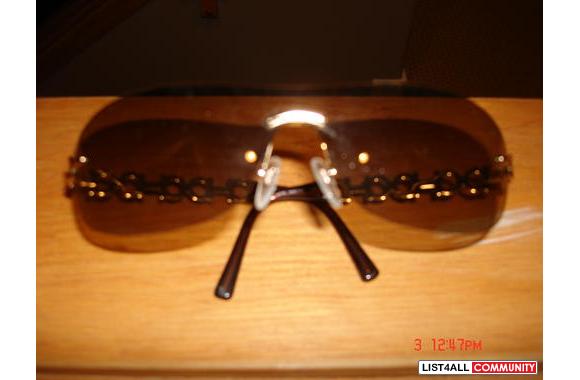 Authentic Feragamo Sunglasses worn only a couple o