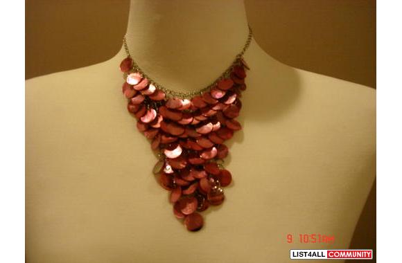 Brand New pink shell necklace its beautiful!! Have