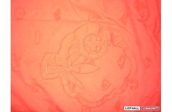 orange Kuyichi authentic tee w/ a cool patternworn