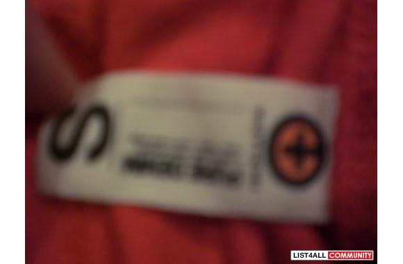 orange Kuyichi authentic tee w/ a cool patternworn