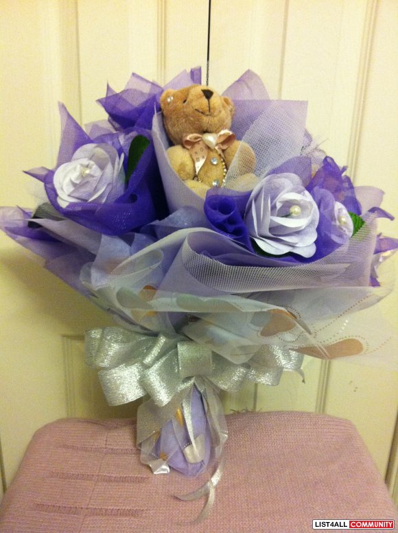 bouquet of roses with teddy bear